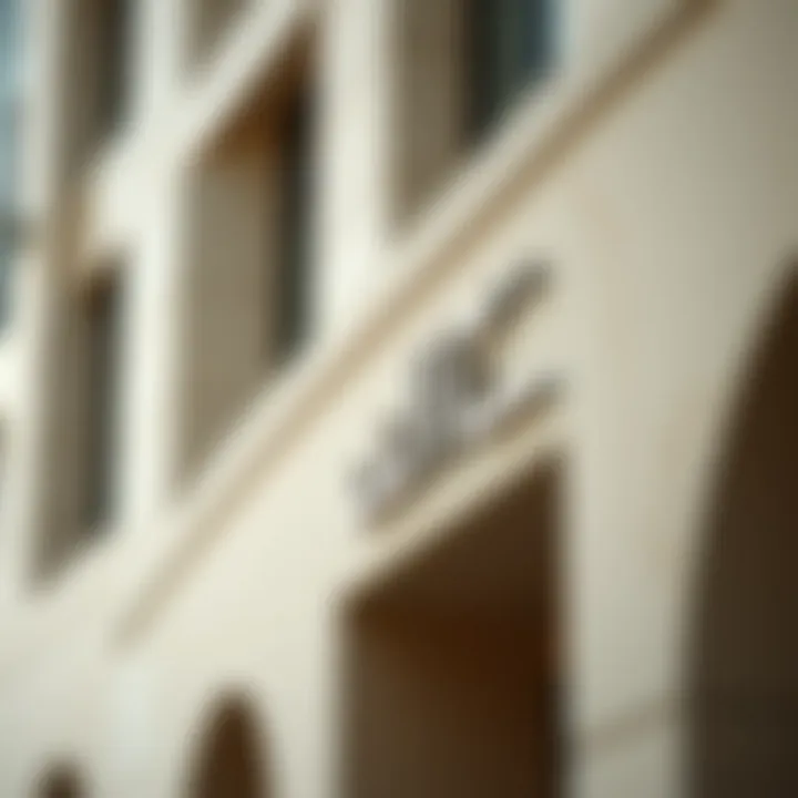 A close-up of a building's nameplate, emphasizing the design and significance of its name.