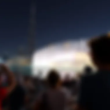 Crowd gathered to watch the Dubai Fountain Show with Burj Khalifa in the background
