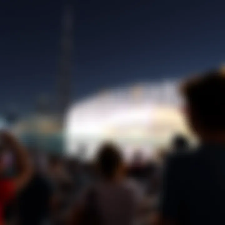 Crowd gathered to watch the Dubai Fountain Show with Burj Khalifa in the background