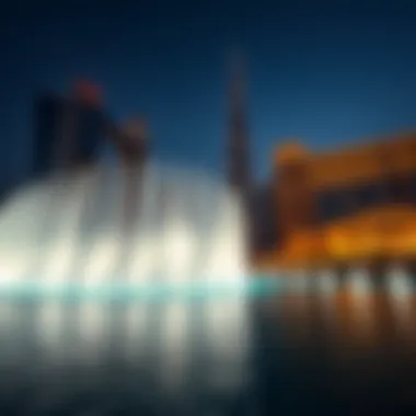 The Dubai Fountain Show in the foreground with the skyline of downtown Dubai
